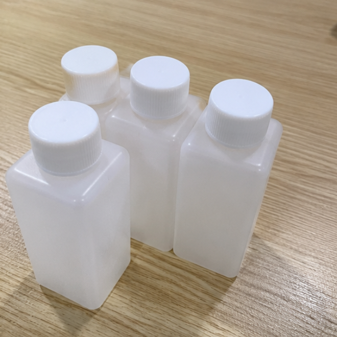 全自动PE瓶灌装锁盖机日化行业应用